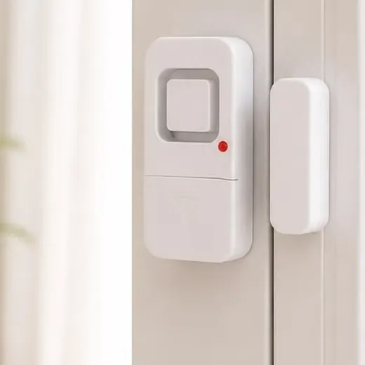 A door and window security sensor on a window frame